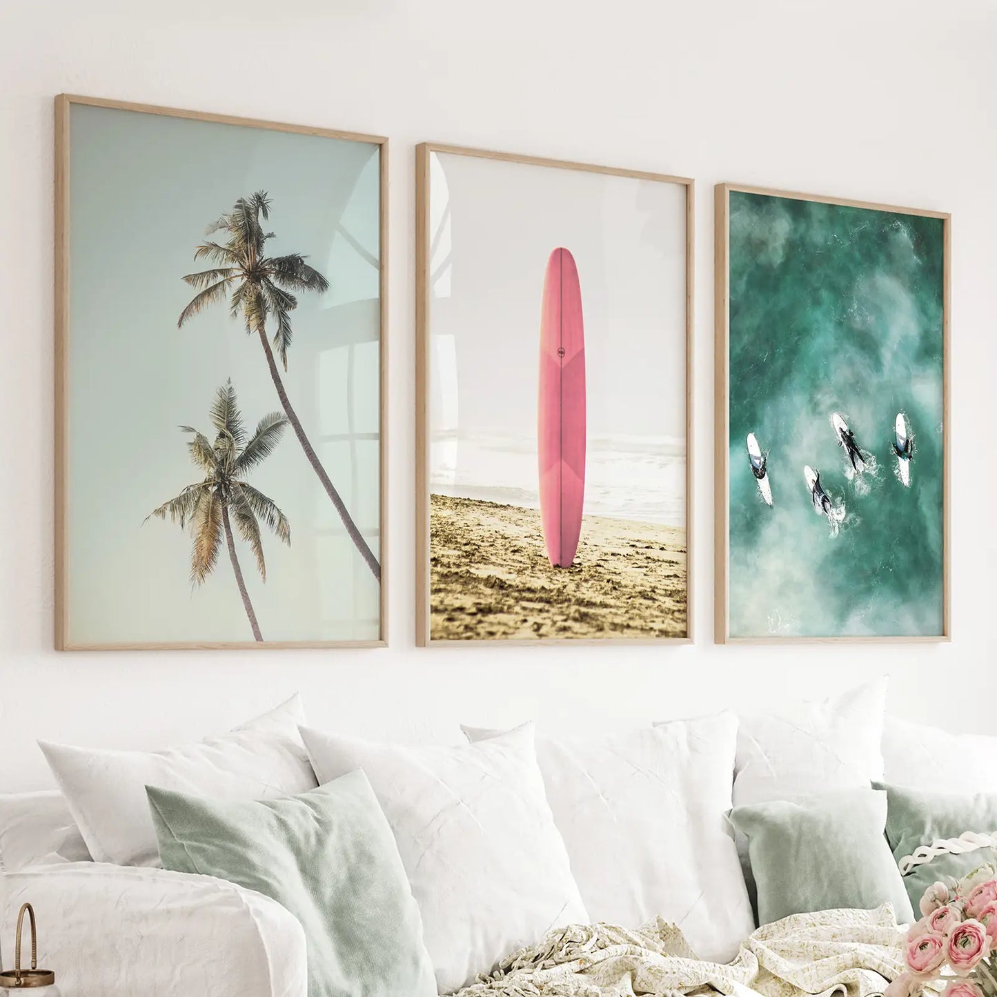 Set of 3 pastel beach prints with a pink surfboard, turquoise wave, and palm leaves