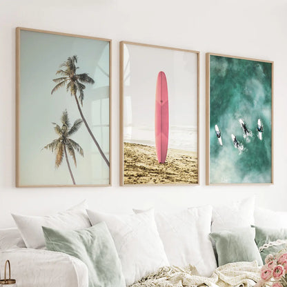 Set of 3 pastel beach prints with a pink surfboard, turquoise wave, and palm leaves