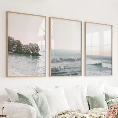 Pink ocean sunset wall art set with coastal rock and rolling waves