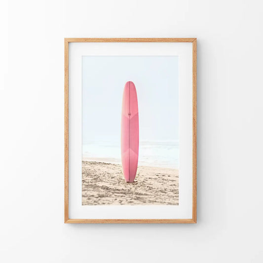 Pink surfboard on sandy beach California coastal wall art print