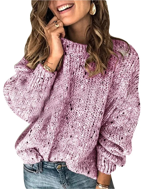 Pink women’s polka-dot knit sweater styled in a soft cozy streetwear look