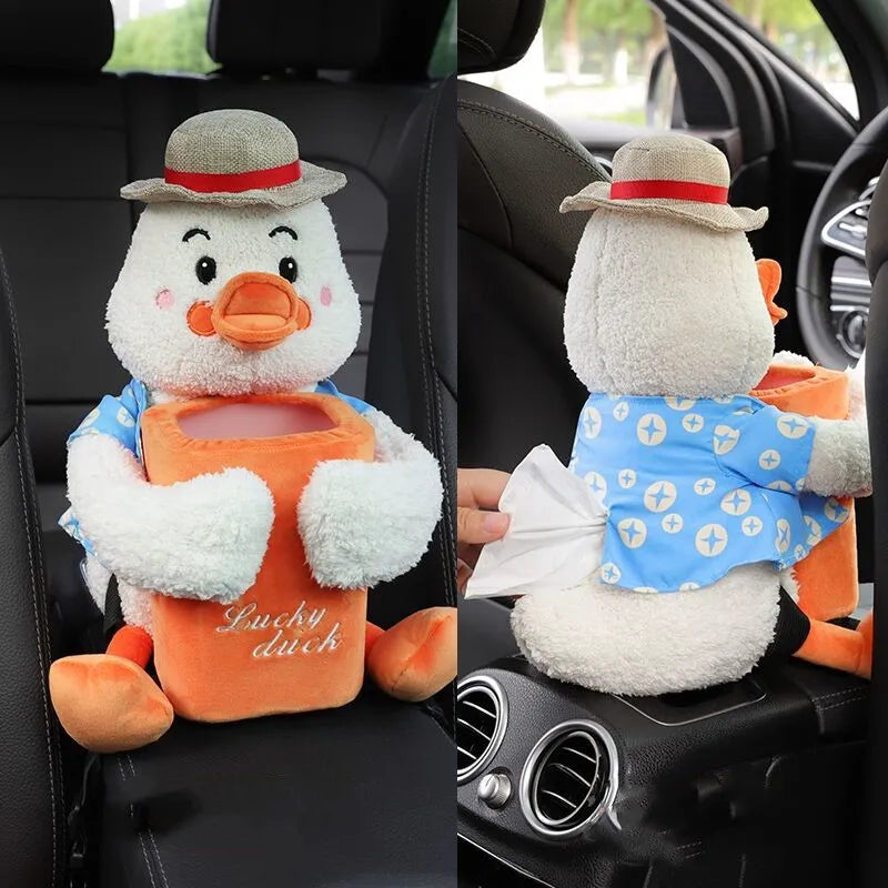 Plush duck toy with tissue holder on a car seat