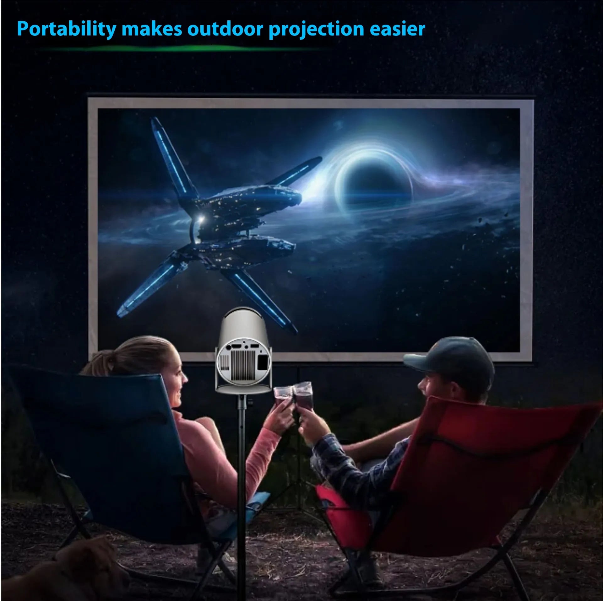 Portable WiFi projector showing outdoor movie night setup
