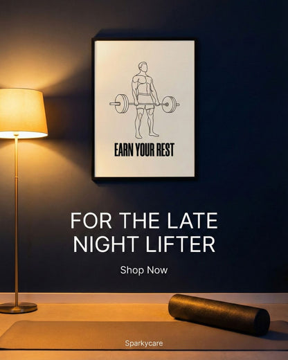 Poster with 'Earn Your Rest' text on a wall above a lamp and exercise mat.