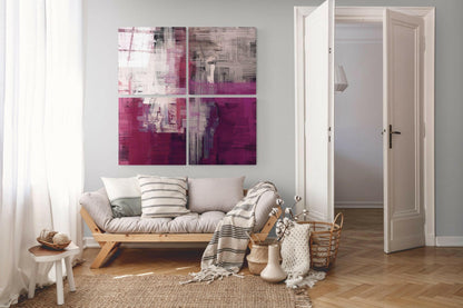 Magenta abstract glass panels on a gray wall above a light wood sofa beside an open white door