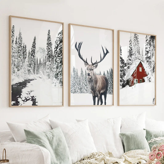 Set of 3 Christmas wall art prints with red log cabin and deer in snowy woods