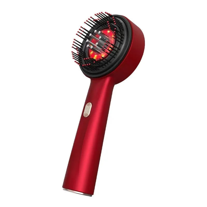Red electric scalp massage comb with glowing LED lights and rounded bristle tips for relaxing scalp stimulation.