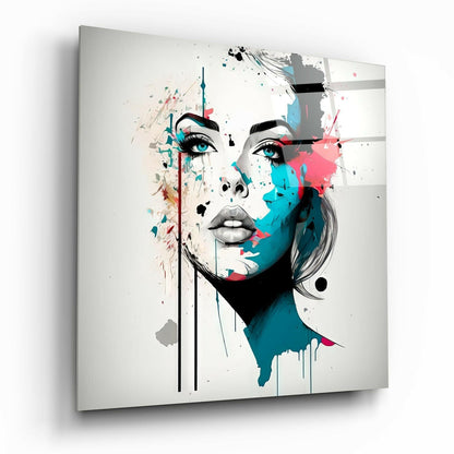 Woman glass wall art hanging on a wall