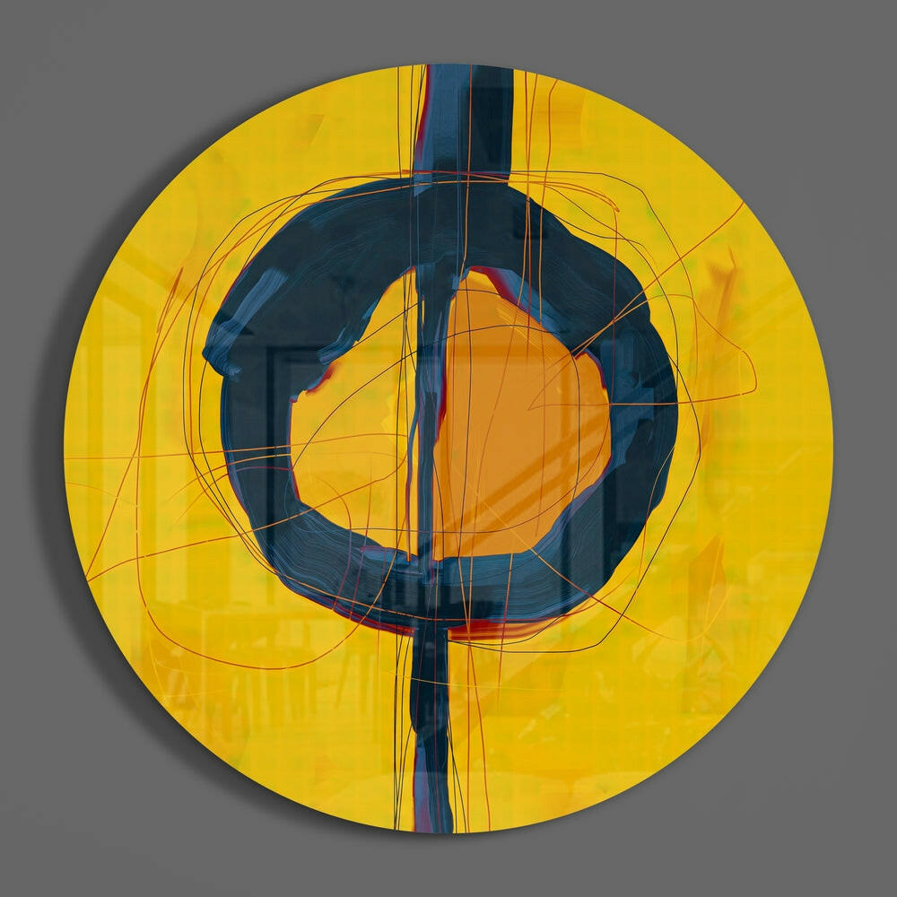 Navy ring on yellow abstract round glass wall art on a gray wall, showing the glossy glass face