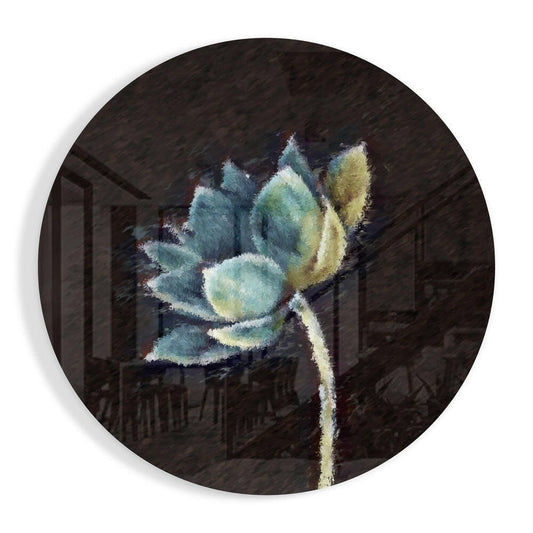 Single teal and pale gold lotus flower on a long cream stem against a near black ground, round glass wall art