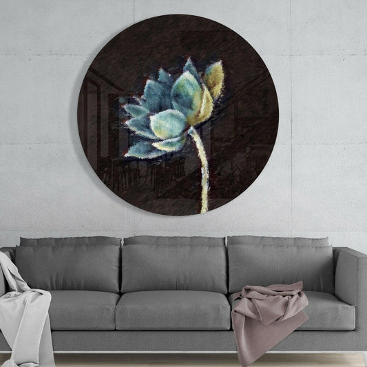 Teal lotus round glass wall art above a gray sofa with a mauve throw against a pale concrete wall