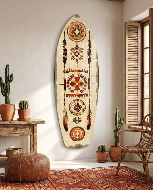 Southwestern surfboard glass wall art in a sunny room with potted cactus, a rattan chair and a red patterned rug