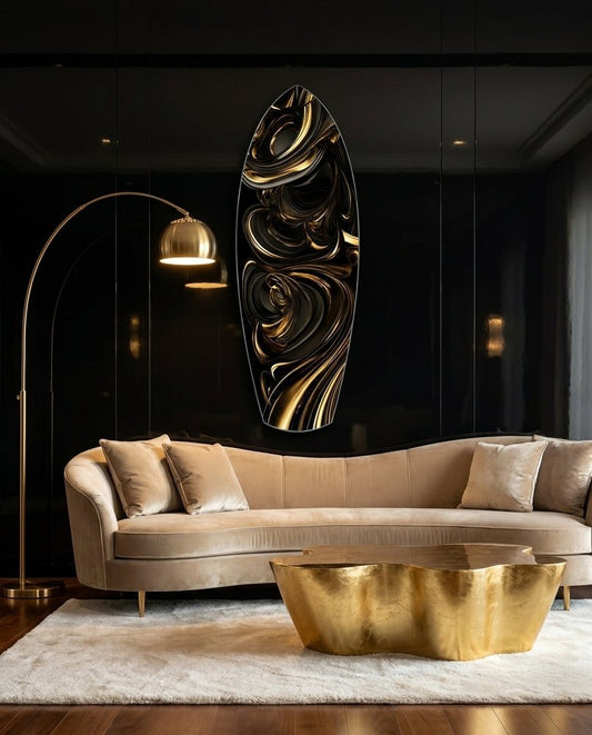 Black and gold swirl surfboard glass wall art on a dark wall above a beige curved sofa and a gold coffee table