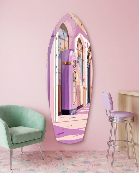 Retro jukebox surfboard glass wall art on a pink wall beside a mint armchair and a chrome bar stool