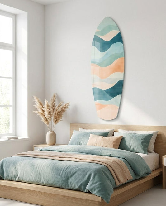 Teal and Peach Wave Bands surfboard glass wall art above a wooden bed with teal and peach bedding in a white bedroom
