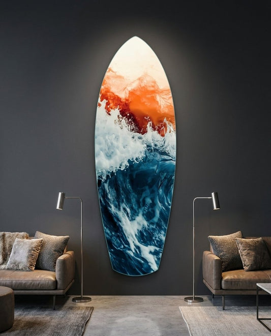 Blue Ocean Waves at Orange Sunset surfboard glass wall art on a charcoal wall between two leather armchairs and floor lamps