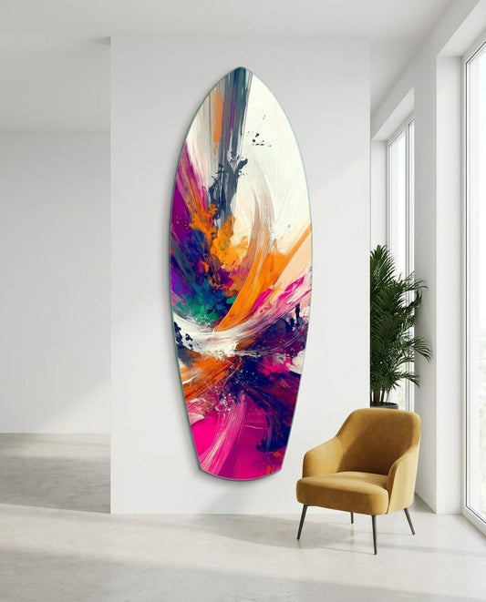 Abstract surfboard glass wall art in a white room with tall windows beside a mustard armchair and a palm