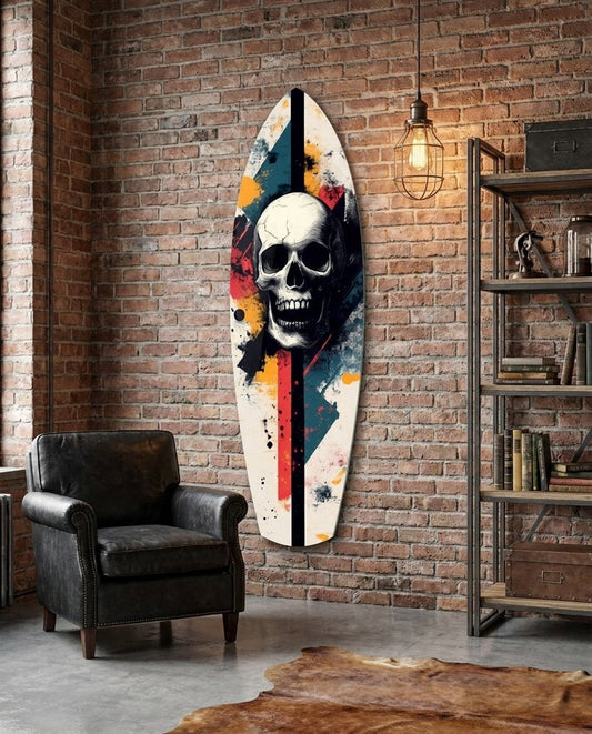 Grunge skull surfboard glass wall art in a brick loft beside a black leather armchair and industrial shelves