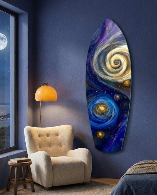 Swirling galaxy surfboard glass wall art on a navy bedroom wall beside a cream armchair and orange lamp