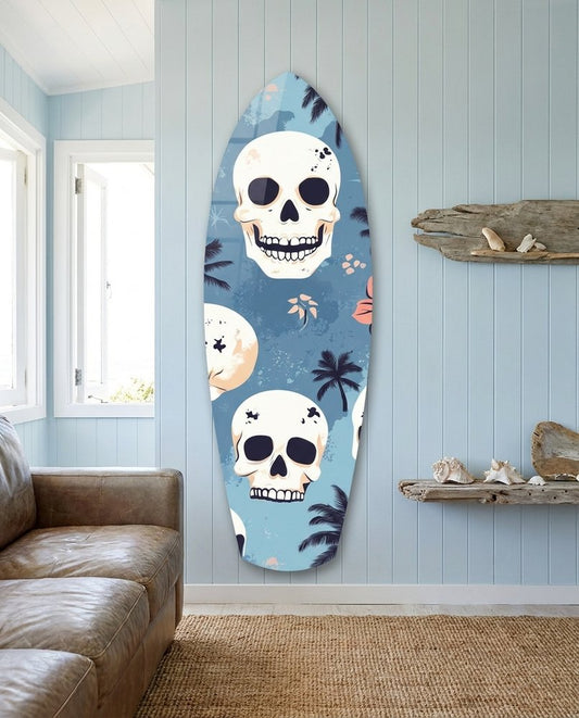 White skulls and dark palm silhouettes on a soft blue surfboard glass panel in a pale blue beach room
