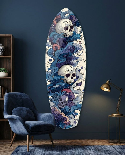 Blue swirl skulls surfboard glass wall art on a navy wall beside a velvet armchair and a brass lamp