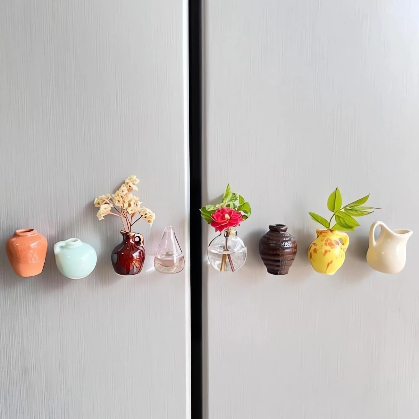 Set of 8 mini ceramic vase magnets showing different designs and colors