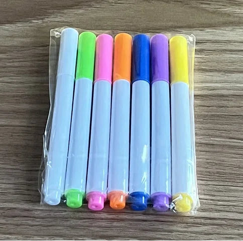Set of multi-color dry erase markers packaged together for acrylic message boards.