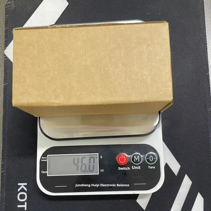 Shipping package on scale 460g - fast bald hair clipper packaged for delivery to customers