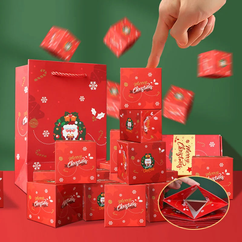 Stacked Christmas surprise cubes shown mid-bounce beside a decorative Santa gift bag