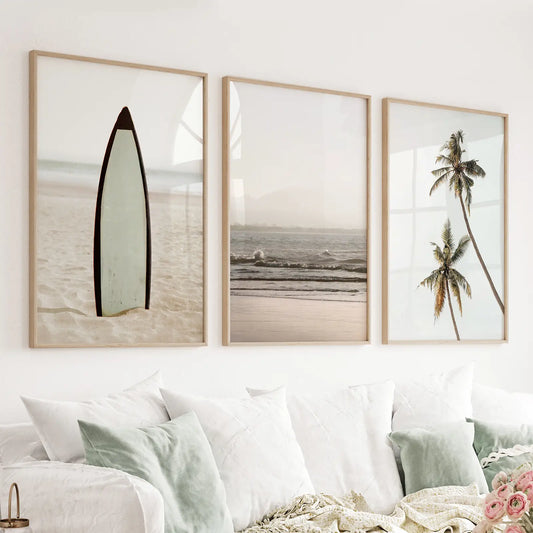 Set of 3 beige coastal prints with a surfboard, ocean waves, and palms