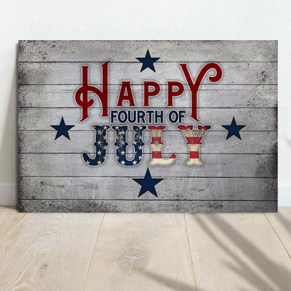 Happy Fourth of July canvas sign with red script, flag-pattern letters and navy stars on gray, on a light wood floor