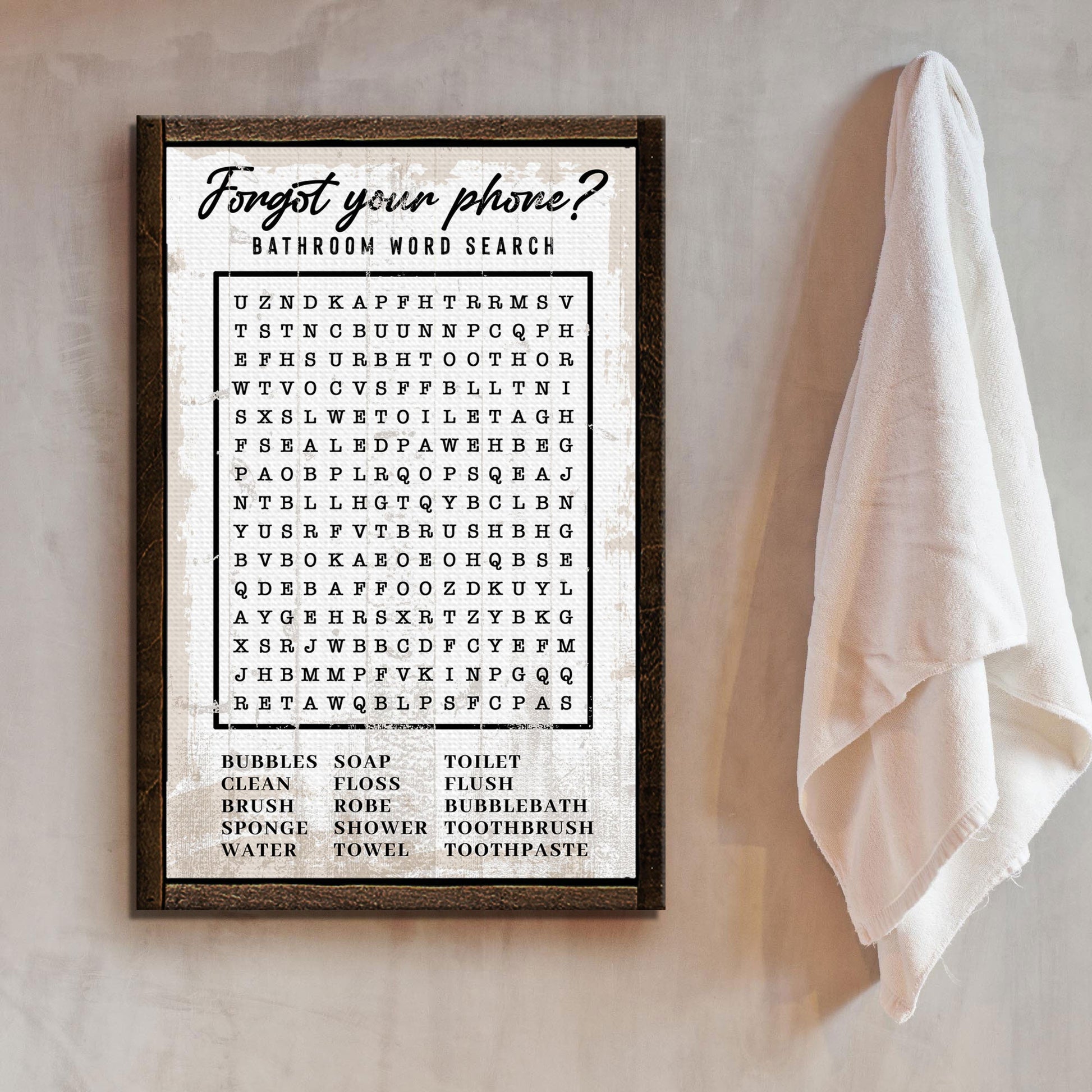 Bathroom word search canvas sign hanging on wall