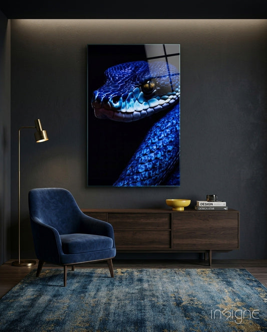 Blue viper glass wall art with glowing cobalt scales on black background