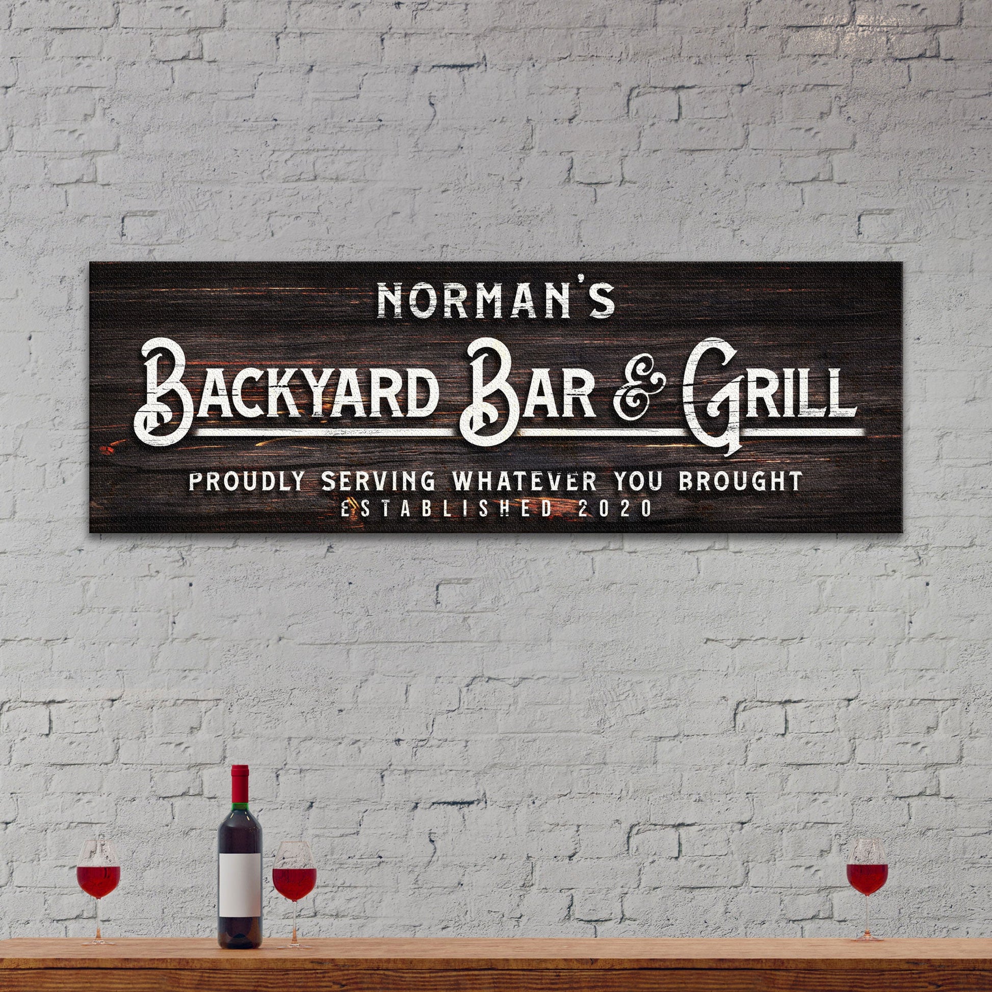 Backyard Bar And Grill personalized rustic word-art canvas sign on a wall