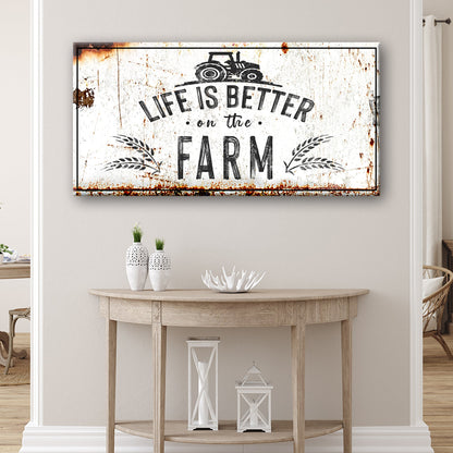 White rustic canvas sign with a tractor and wheat and text: Life is Better on the Farm, above a console table