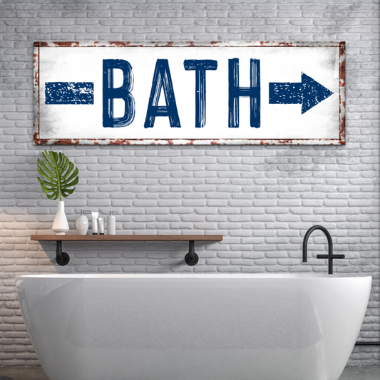 Bath arrow rustic bathroom canvas sign hanging on a wall above a tub