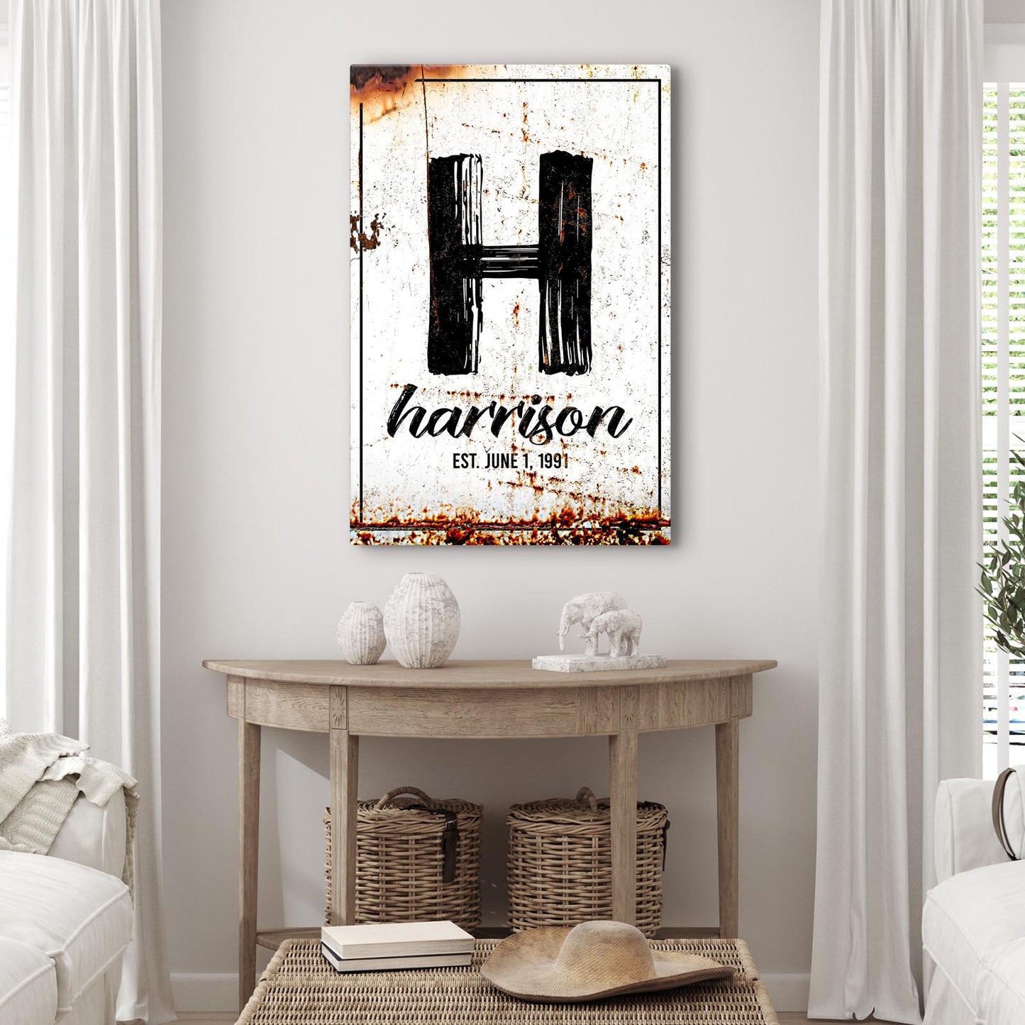 Personalized family name portrait canvas sign hanging in an entryway