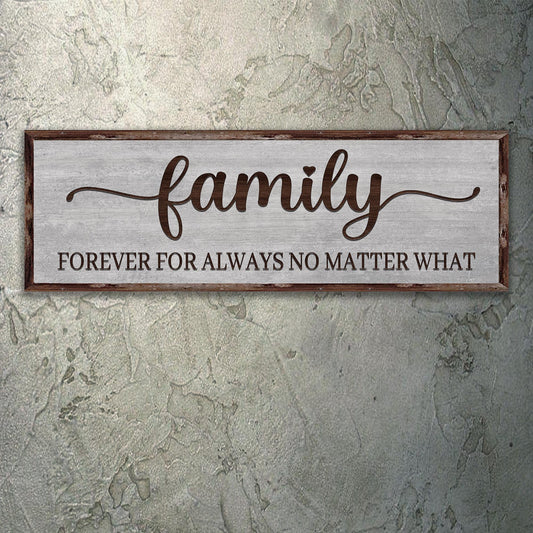 Family canvas sign with brown script on a gray wood-look background, hung on a mottled gray-green wall