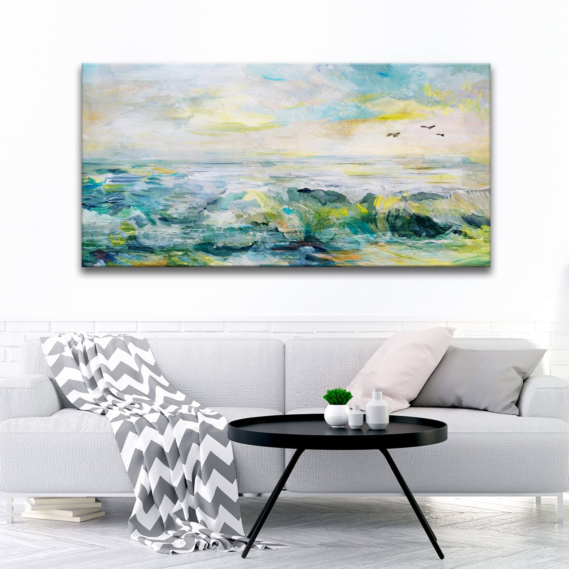 Coastal canvas wall art of rocks, sea, and open sky in calm blue tones