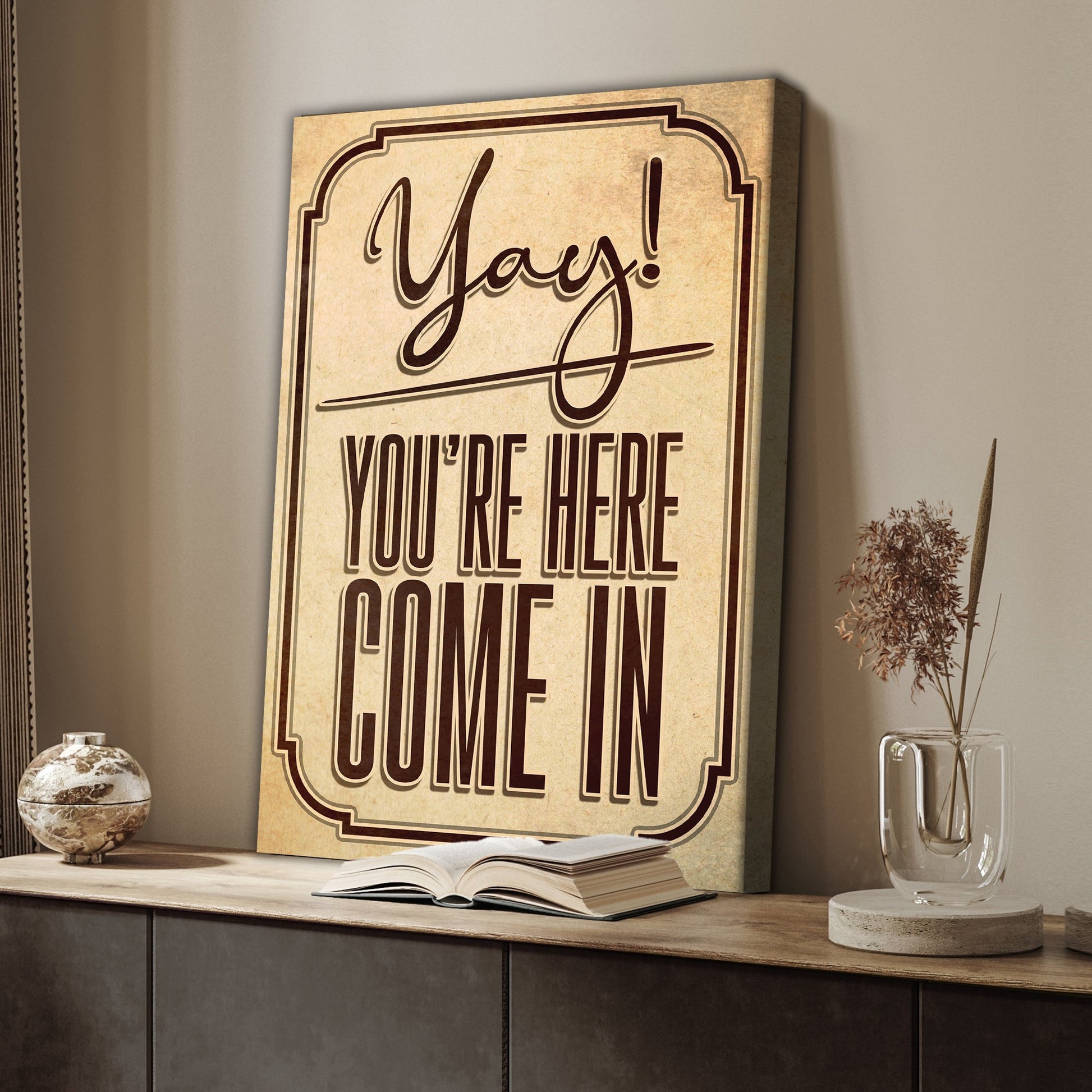 Yay You're Here welcome entryway canvas sign with joyful upbeat lettering