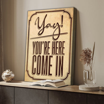Yay You're Here welcome entryway canvas sign with joyful upbeat lettering
