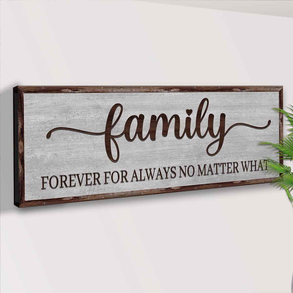 Angled close-up of the Family canvas sign showing its dark brown edge and the words Forever For Always No Matter What