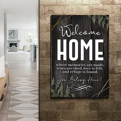 Welcome Home You Belong Here canvas sign on a stone tile wall beside a hallway