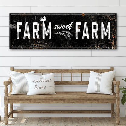 Farm Sweet Farm canvas sign in the black distressed style above a wooden bench with pillows