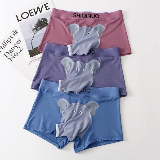 Three pairs of shorts with elephant designs on a white background