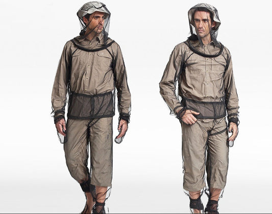 Two models wearing a beige insect repellent suit on a white background