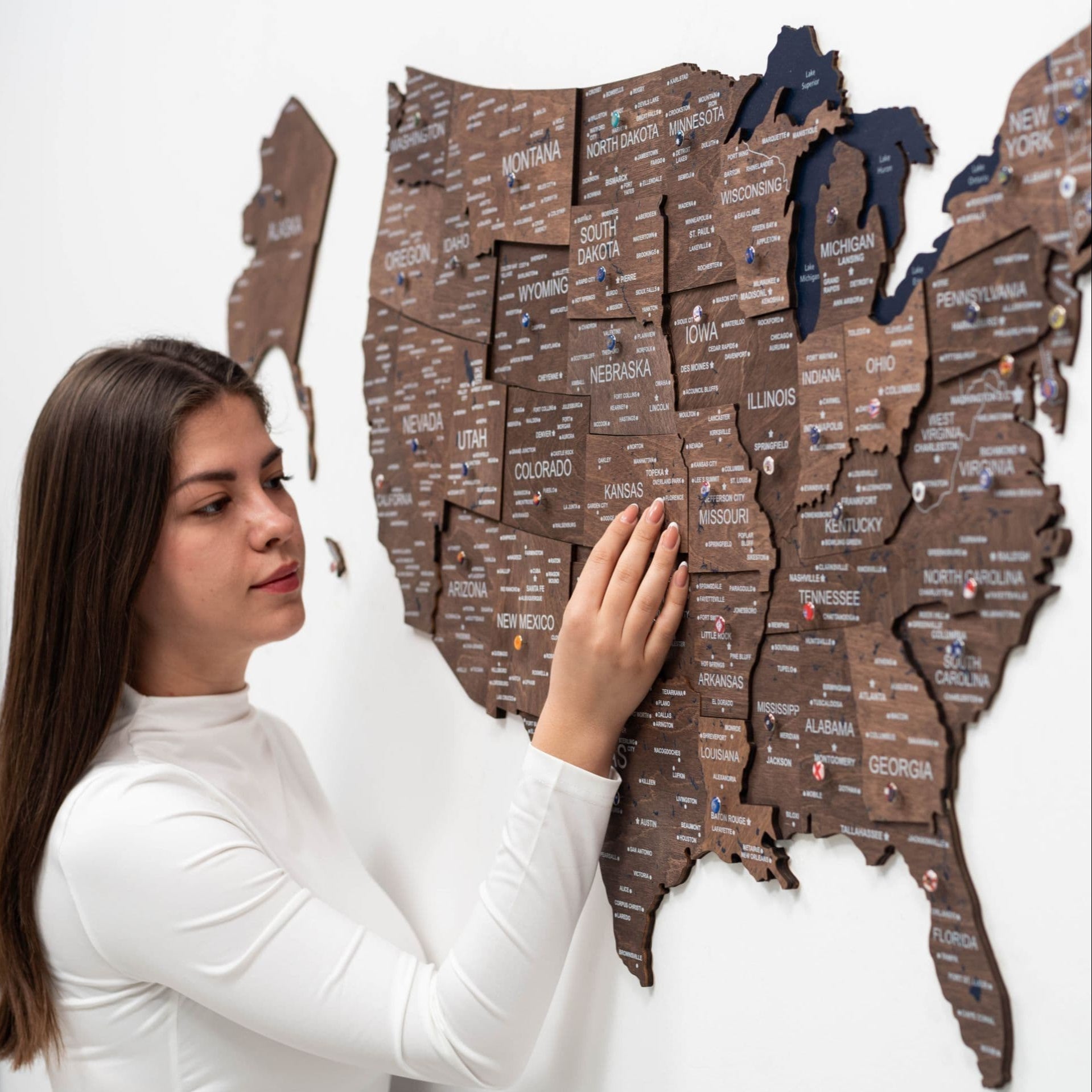 Wood 3D USA map wall art in dark walnut finish on a wall