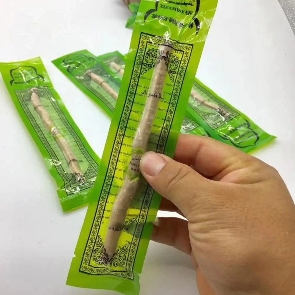 Vacuum sealed miswak sticks in green packaging for fresh natural oral hygiene