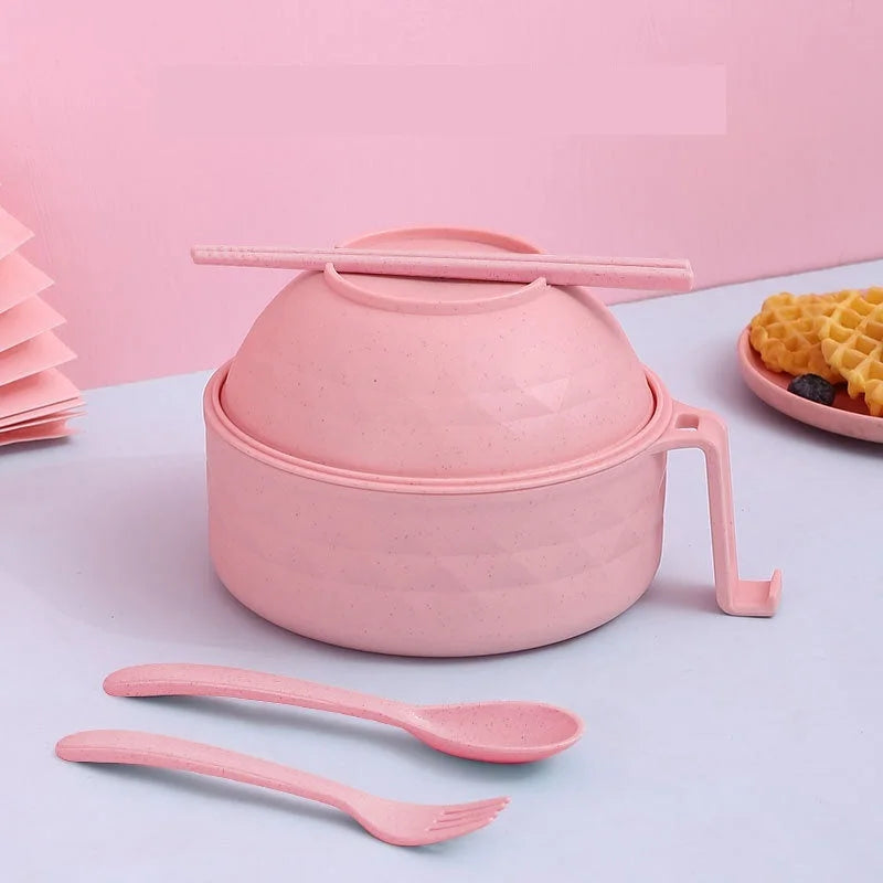 Wheat straw noodle bowl set with lid and utensils shown in soft pink tone
