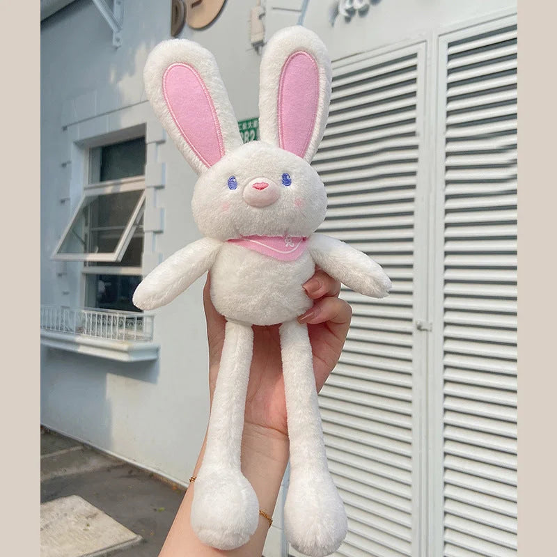 White bunny plush keychain with pink inner ears and embroidered face featuring long stretchy legs and collar